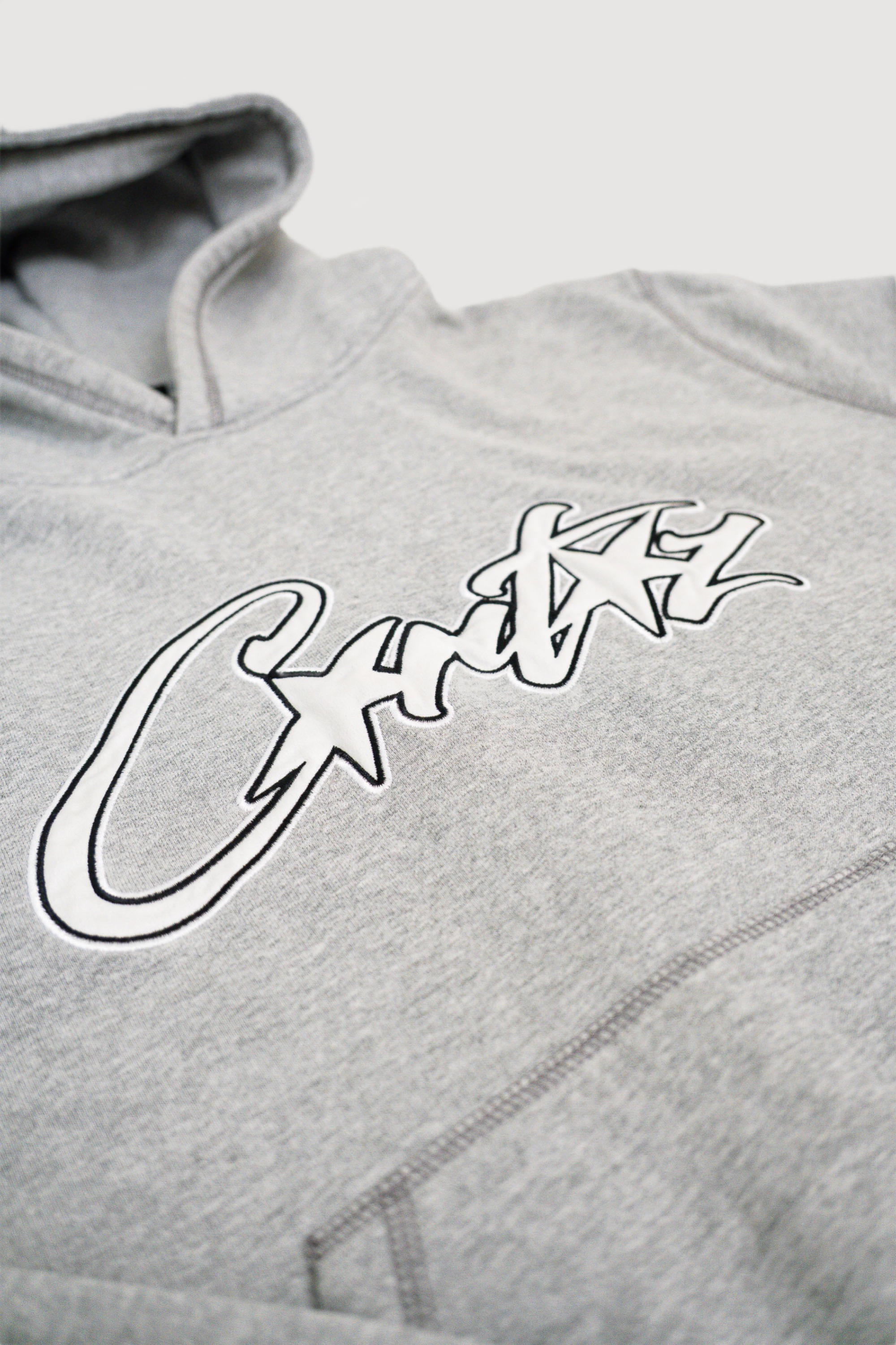 Corteiz Satin Allstarz Applique Hoodie Grey worn by Sandy