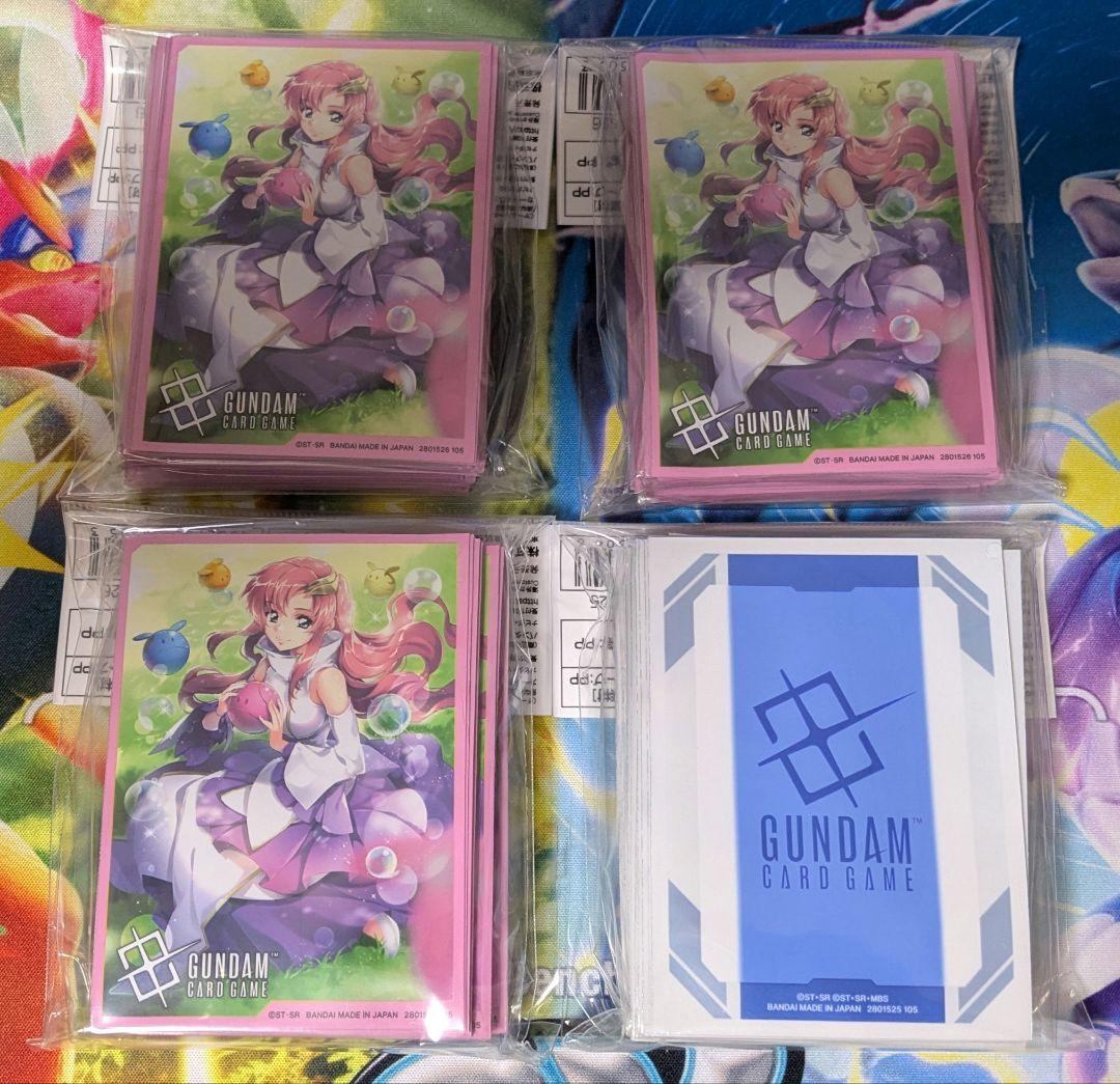 【新品・未開封】ガンダムカードゲーム スリーブ 溢れる慈愛＋ロゴ 4点セット 特価品〕溢れる慈愛/U＋/β【白】《COMMAND》 パラレル版GD01-118(β